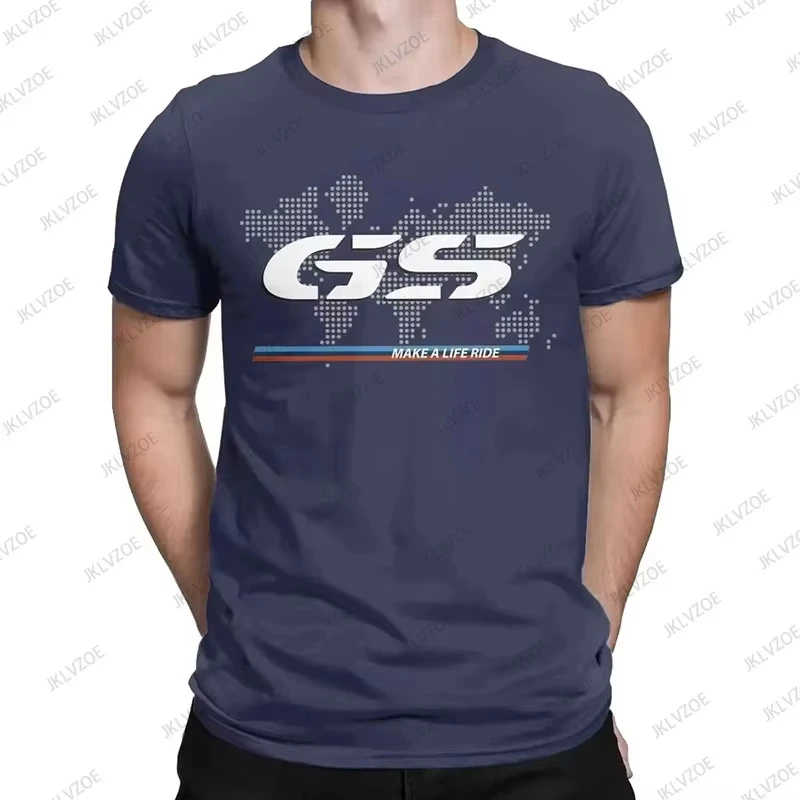 Man wearing BMW R1250GS cotton T-shirt with bold graphic in a hip hop streetwear setting dark