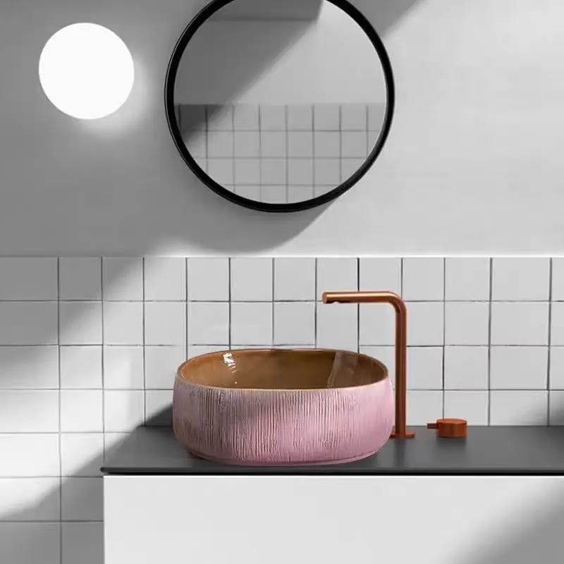 สีชมพูเซรามิคขนาดเล็กแพลตฟอร์มล้างครัวเรือนระเบียงห้องน้ําอ่างล้างจานแบบวงกลม Creative โรงแรมอ่างล้างหน้าเดี่ยวท่อระบายน้ํา Retro ห้องน้ําอ่างล้างจาน 1