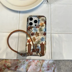 Elegant Floral Leather Wrist Strap Case with Shimmering Silver Laser Design - Korean Style Back Cover - iPhone 15 (Brown)