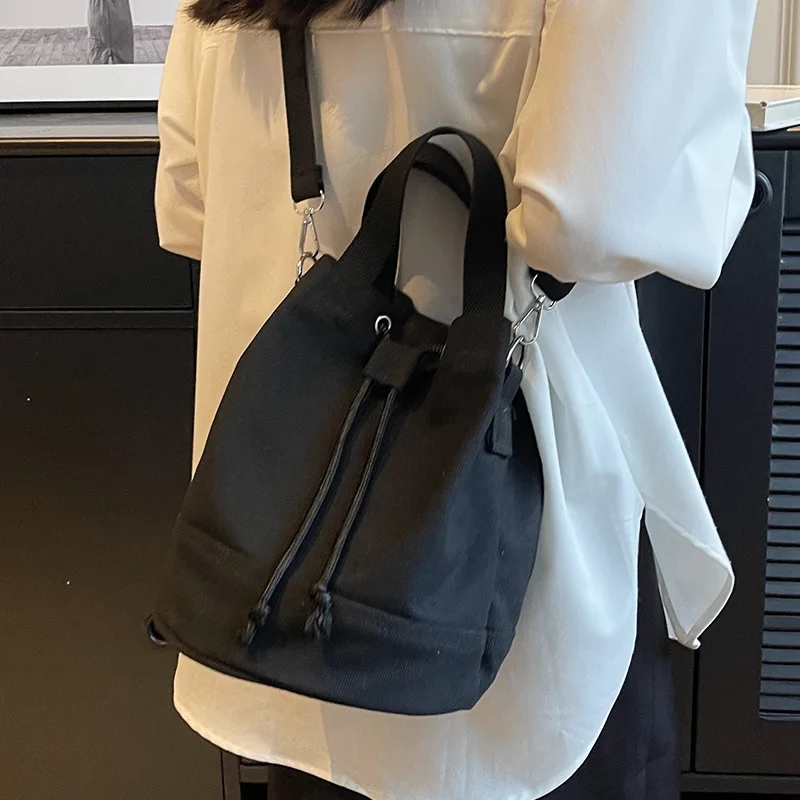 2024 New Korean Fashion Simple Canvas Bag Women's Leisure Handheld Bucket Bag Student Versatile One Shoulder Crossbody Bag