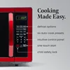 Farberware Countertop Microwave 1000 Watts, 1.1 cu ft. Microwave Oven With LED Lighting and Child Lock - Easy Clean Metallic Red 3