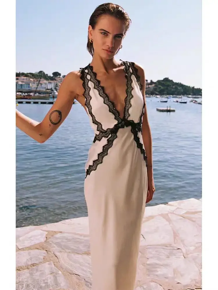 

24 year spring/summer seaside vacation style personality color contrast waist sexy low V-neck lace edge dress