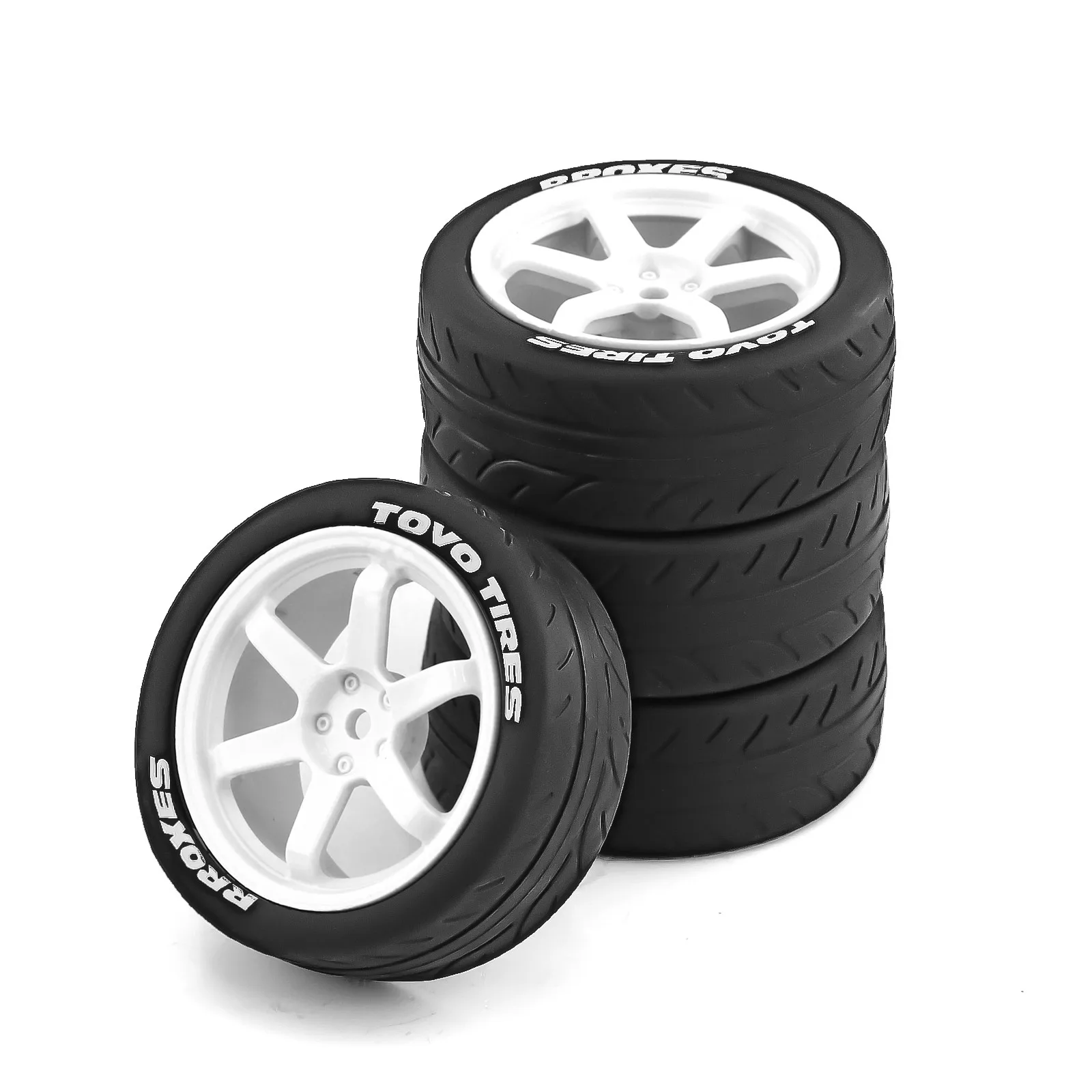 Vue de côté des pneus RC 1/10, hexagone 12mm visible, caoutchouc souple pour rallye