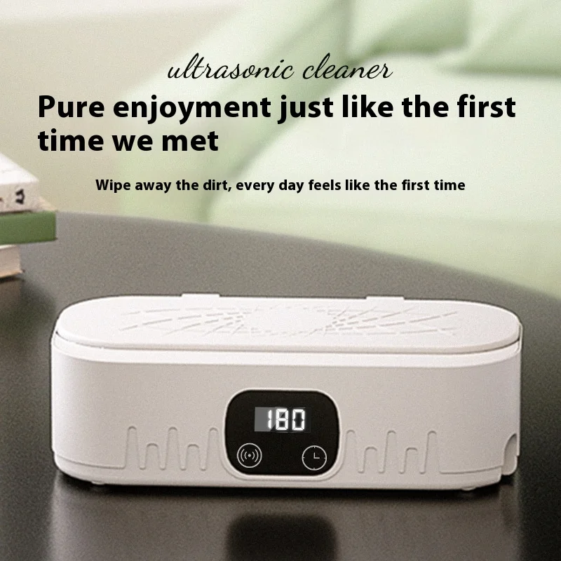 Small ultrasonic home cleaner high-frequency vibration tool for glasses, jewelry, and tableware for deep cleaning.