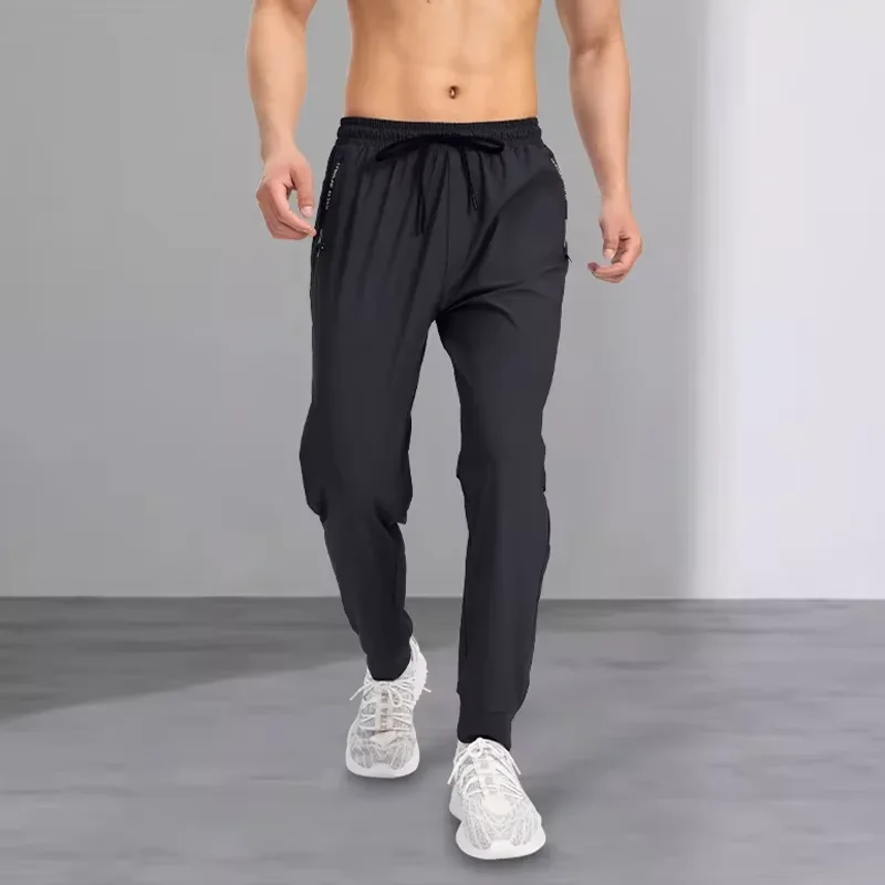 Ice silk pants men's quick drying elastic trend casual pants ultra-thin ice sports