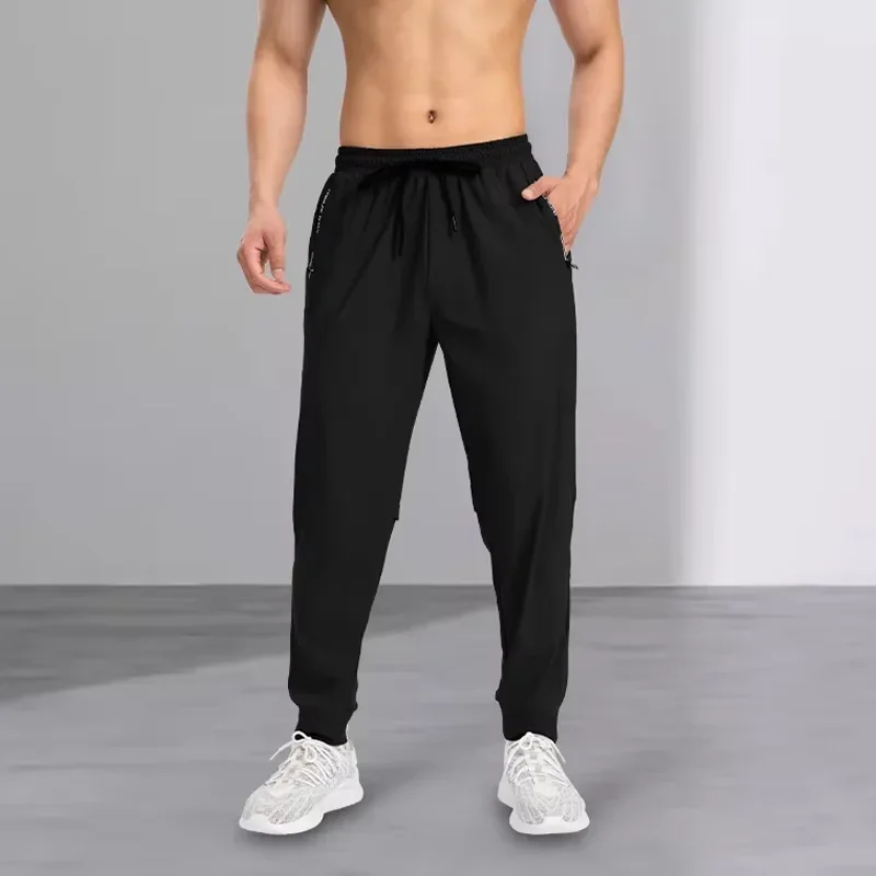Ice silk pants men's quick drying elastic trend casual pants ultra-thin ice sports