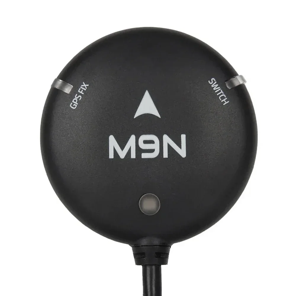 Connecteurs et câbles du module GPS Holybro M9N avec boussole IST8310 et indicateur LED pour drones RC FPV, détail des soudures et du port USB.
