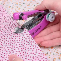 Home handheld portable mini manual sewing machine handheld pocket outdoor travel small sewing machine 1