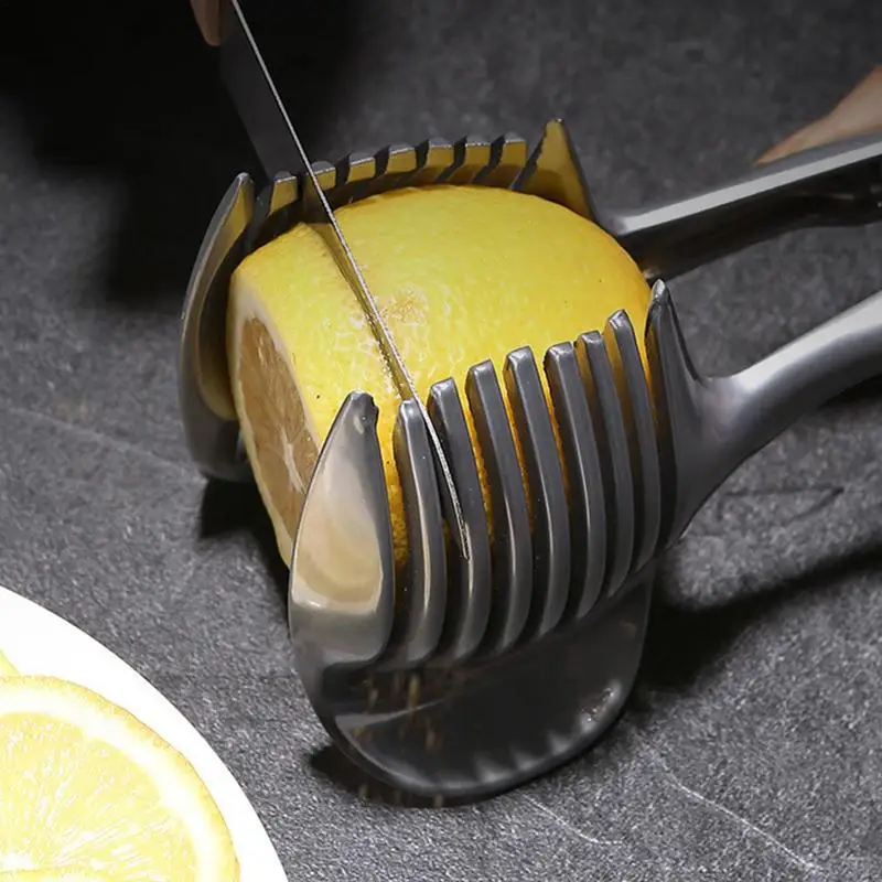 https://ae01.alicdn.com/kf/S4cf373ad427d48f082958a58b0477345z/Lemon-Slicer-Stainless-Stee-Tomato-Potato-Fruit-Slicer-Cutter-Shreadders-Fruit-Cutting-Aid-Holder-Kitchen-Gadgets.jpg