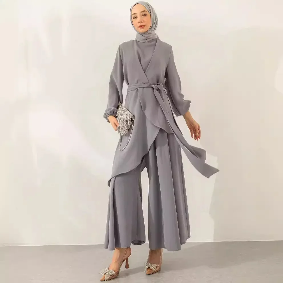 Modest two-piece women's Muslim outfit with a top tie and wide-leg pants suitable for Ramadan in Morocco, Dubai, Islam, casual Arabic clothing collection.