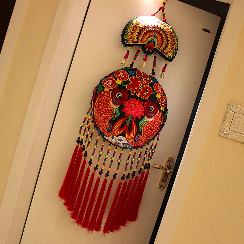

Chinese ethnic fabric porch hanging Yunnan Pisces large purse pendant store restaurant decorations.