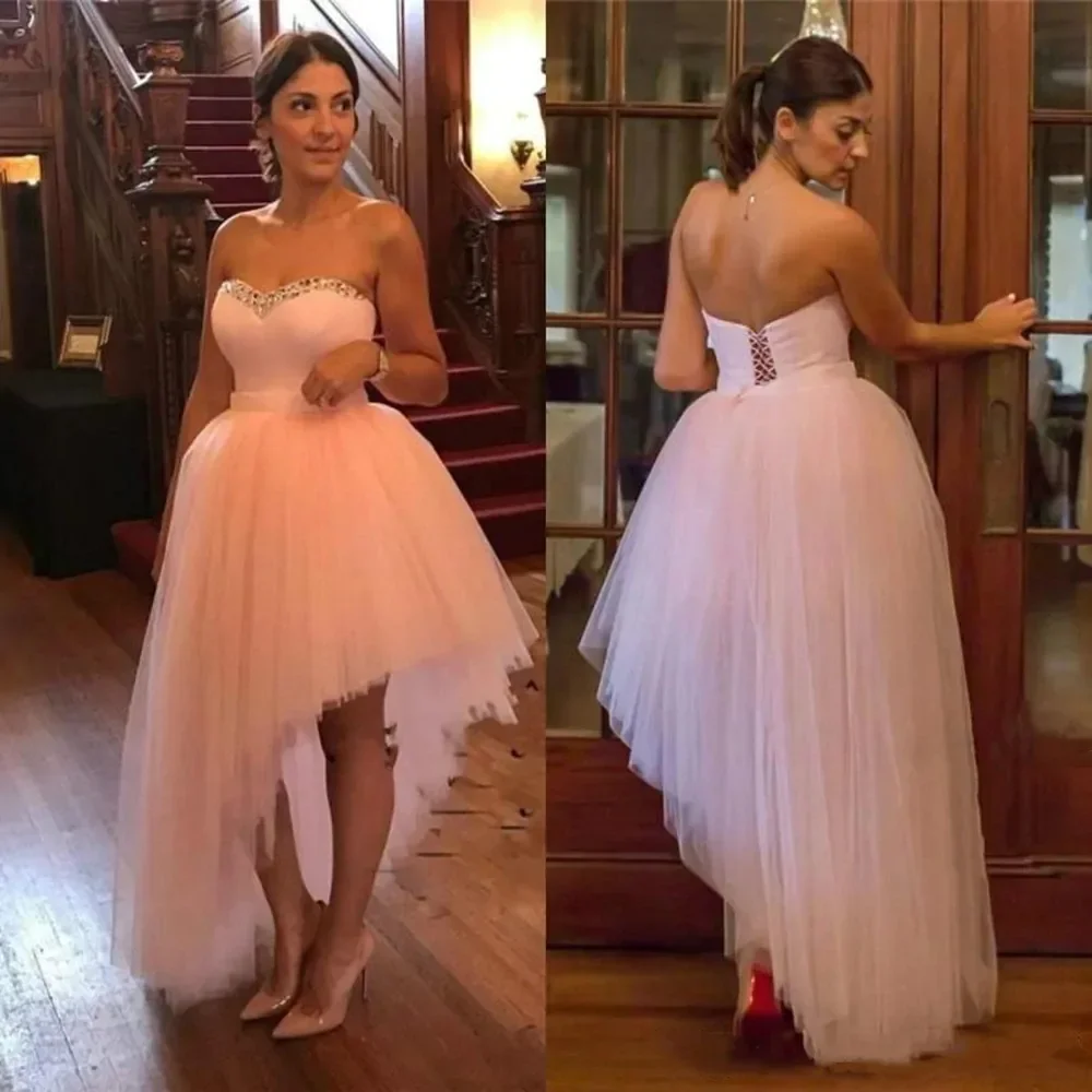 

Sexy Sweetheart Crystals Beaded Light Pink Prom Dresses High Low Evening Gowns Strapless Formal Party Dress