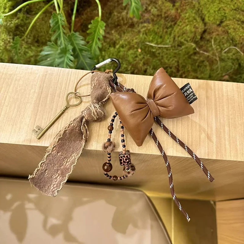 Vintage Brown Leather Bow Key Pendant Fashion Lace Ribbon Keychain Beading Braided Lanyard Key Ring Suitable for Women Bag