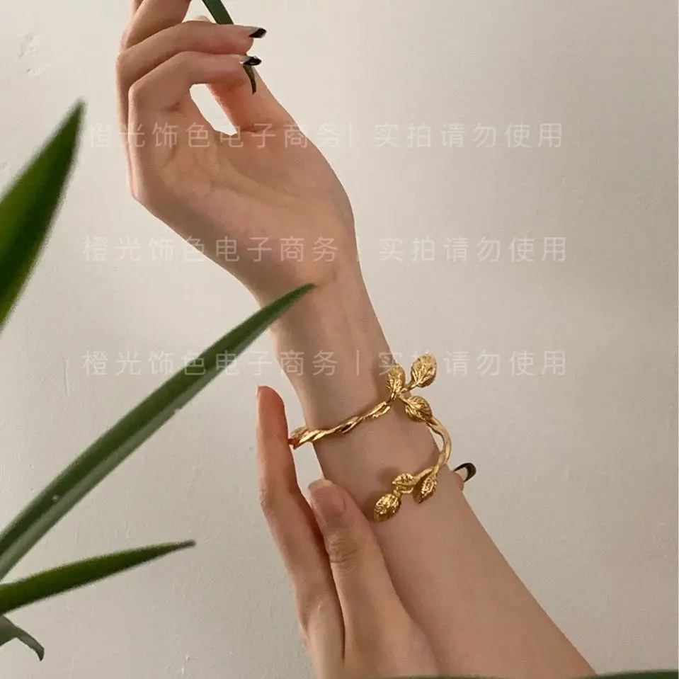 

LONDANY bracelet vine winding leaf styling element bracelet literary fan opening adjustable bracelet woman bangel