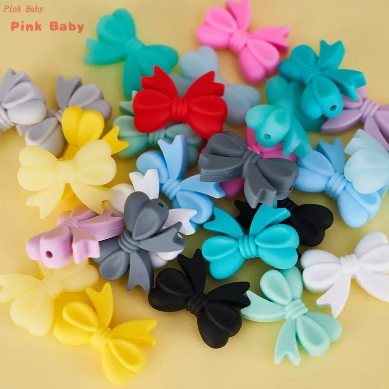 

20pcs Bowknot Silicon Teether Beads BPA Free Bow Tie Baby Teething Bead DIY Pacifier Chain Making Chewable Toys Accessories