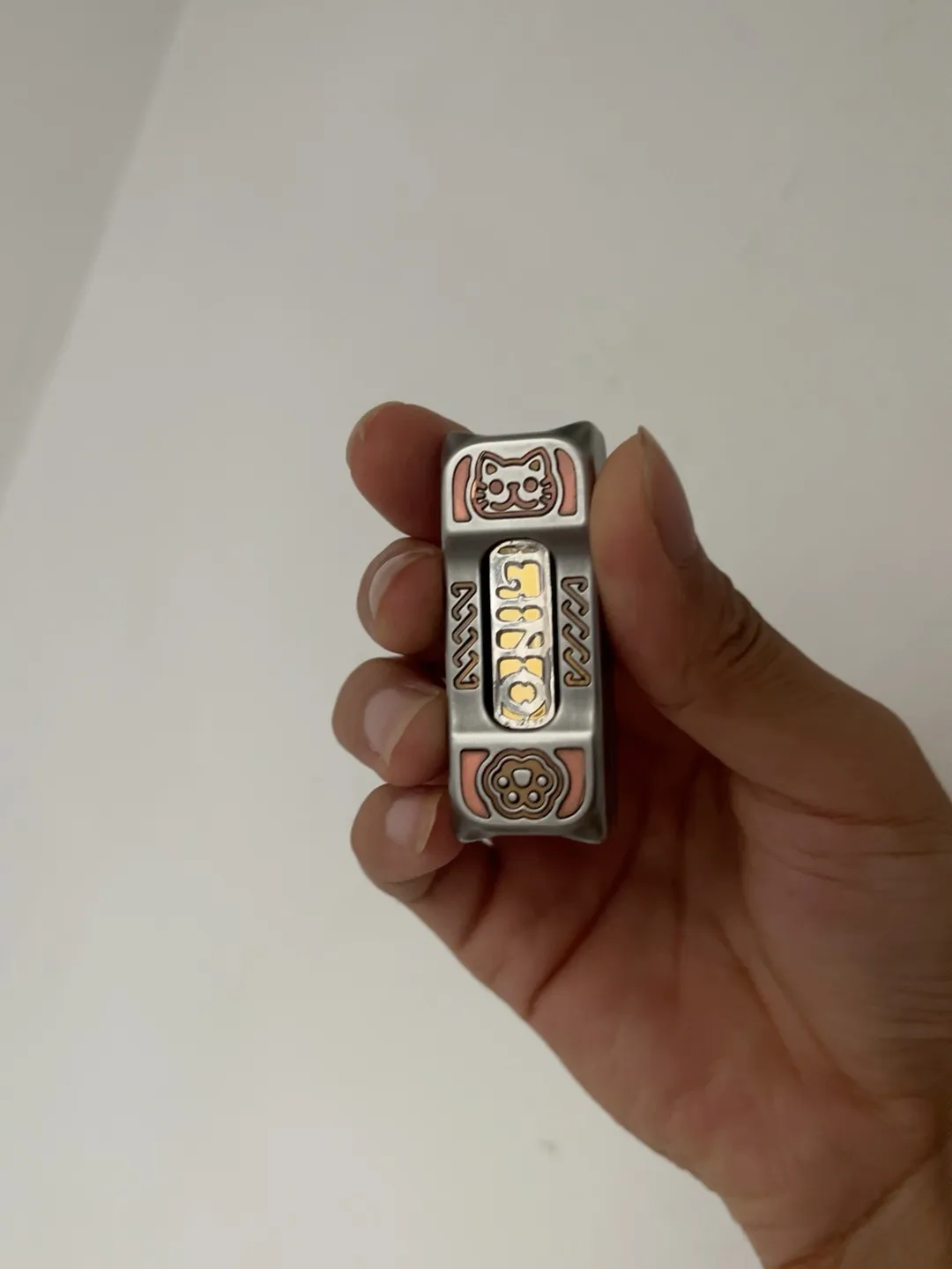 

Климбо Кот Push Card из латуни и фиолетовой меди Edc