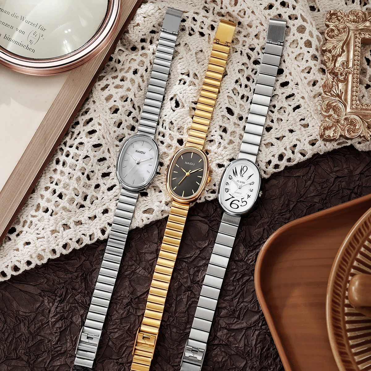 Ladies' exquisite and high-value Arabic numeral scale oval dial bamboo style steel strap quartz watch. 6