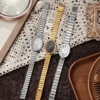Ladies' exquisite and high-value Arabic numeral scale oval dial bamboo style steel strap quartz watch. 6