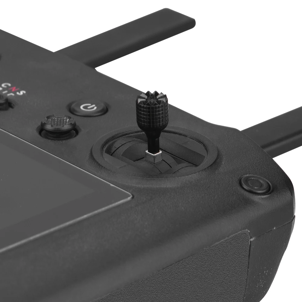 Joystick de rechange pour radiocommande RC Pro, gros plan sur le mécanisme en cuivre et la base grise.