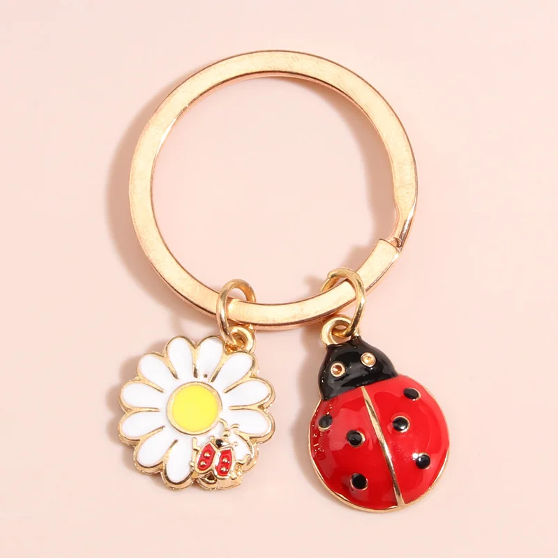 PATIKIL Portachiavi con ciondolo a forma di fiore, accessorio