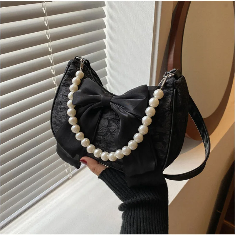 Fashion bow handheld pearl bag trend new crossbody small bag ladies shoulder