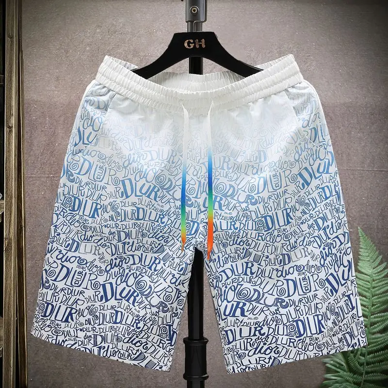 2024 Summer Casual Loose Fashion Trend Quick Drying Thin Sports High Waisted Drawstring Printed Five Point Beach Pants for Men