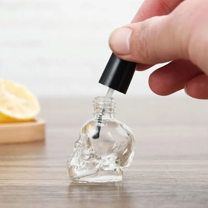 

10pcs/lot 10ml Skull Empty Nail Polish Bottle With Black Small Brush Nail Art Container Glass Nail Oil Bottles