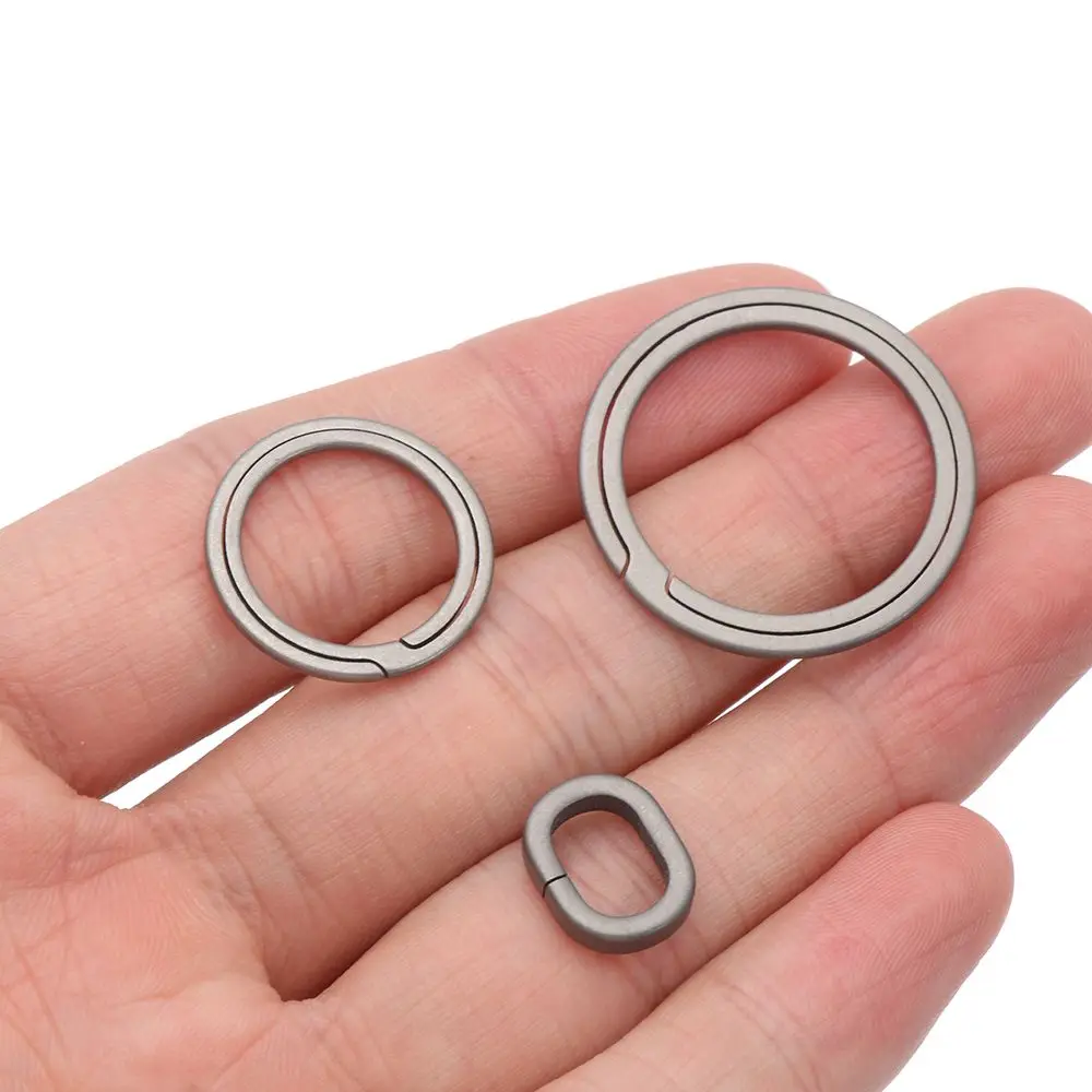 

10mm/20mm/28mm Lightweight Titanium Alloy Key Rings Keychains Buckle Pendant Super Man Car Keychain Accessories for Male Gift