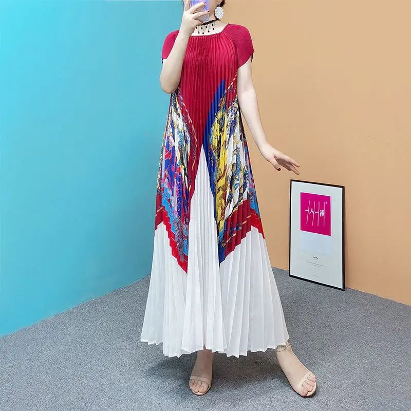 

Temperament green short sleeved slimming dress female 2023 summer new pleated print loose fitting fashion mid length dress