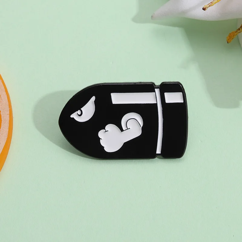 Cartoon black bullet brooch personality shell shape funny pins Bag decoration metal badge Accessories Gift to friends metal brooch,metal pins,cartoon pins,fashion brooches