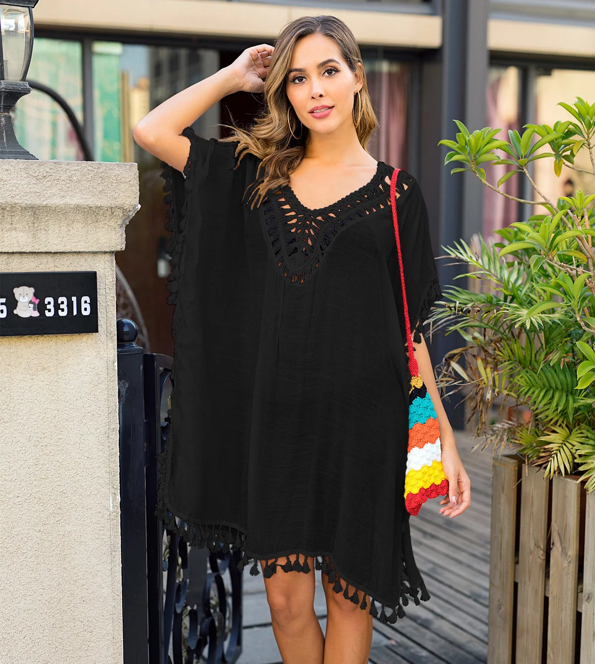 Women's hook splicing tassel sexy backless skirt loose split sun protection beach blouse 3012