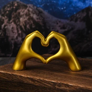 Gold Heart Hand Statue 1