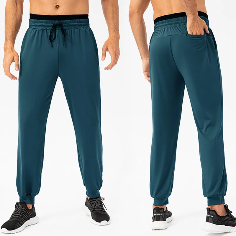 

Men's Jogging Sweatpants Elastic Shrink Leg Casual Outdoor Training Fiess Sport Pants Running Trousers