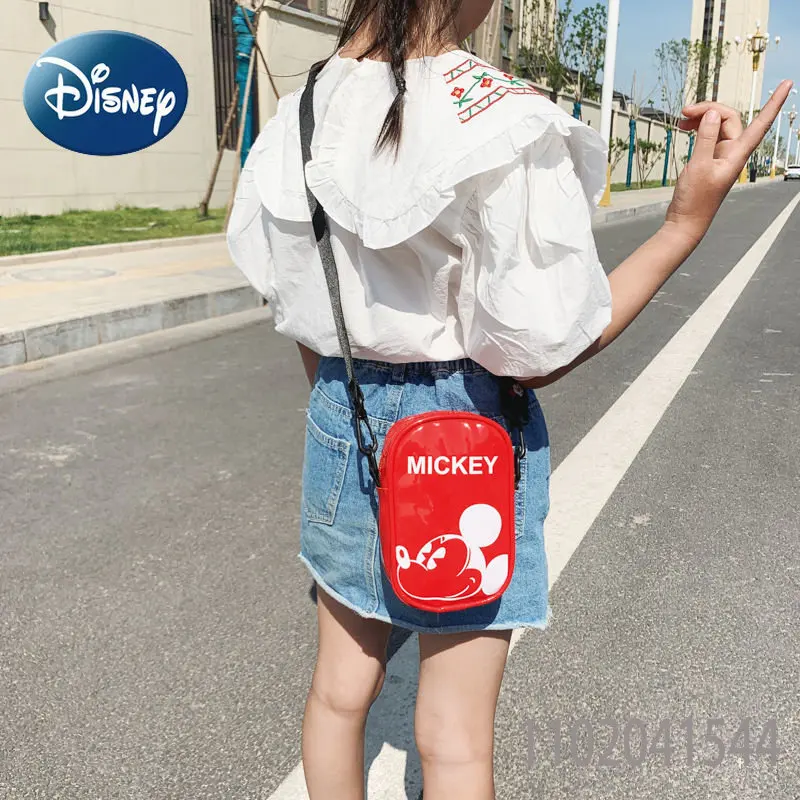 While looking for a classic, and adorable Mickey Purse, I stumbled