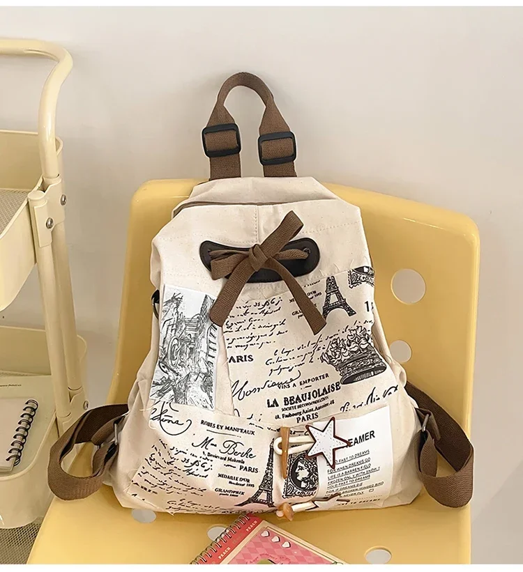 thumbnail image 1 of Mochila de nailon con grafiti versátil y de gran venta para mujer, nueva tendencia 2024, bolso escolar de gran capacidad para desplazamientos, 1 of 5