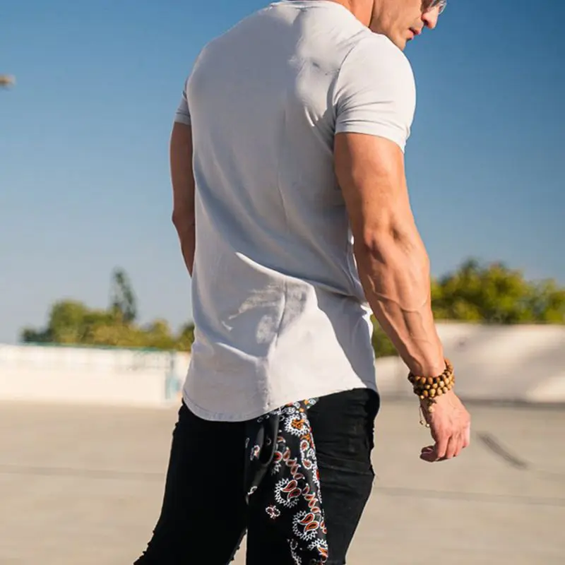 T-shirt sportiva da fitness da uomo Bodybuilding manica corta camicia da allenamento allenamento Sport corsa palestra T-shirt estiva Top Tee Rashgard - immagine 6
