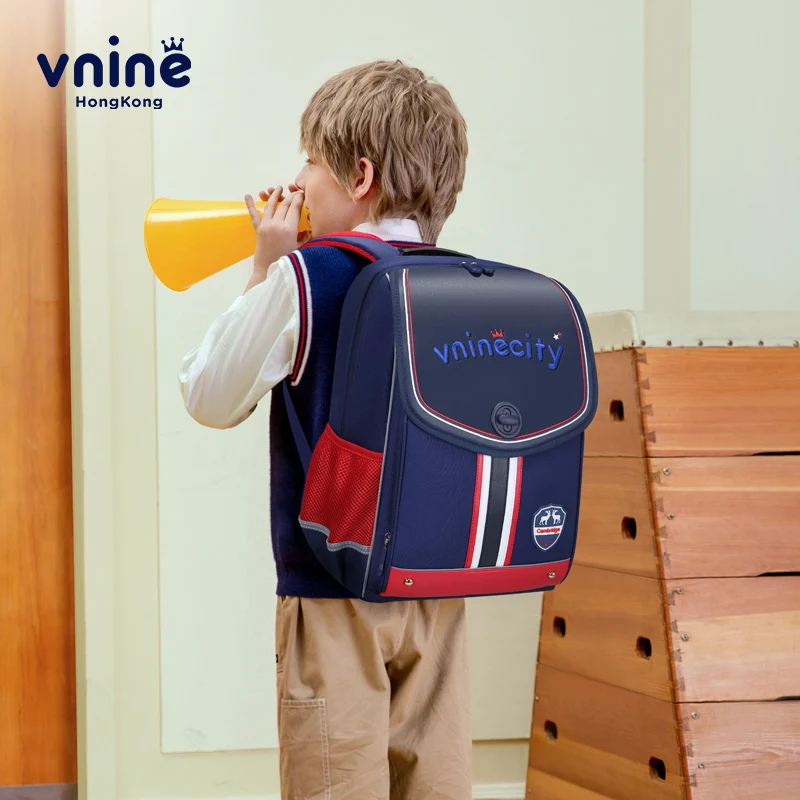 VNINE backpack for elementary school girls and boys from grades one to six, lightweight spine protection backpack for girls