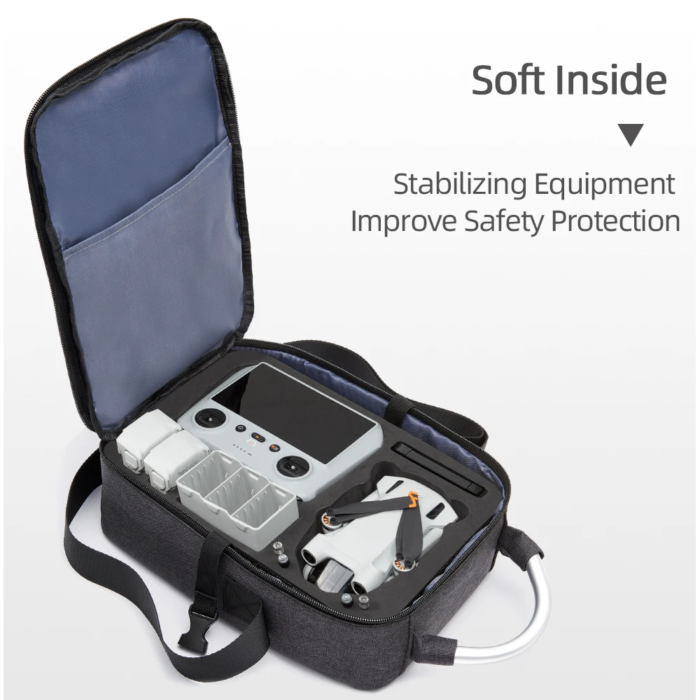 Sac de rangement pour DJI Mini 3 Pro posé sur une valise, idéal pour les voyages en extérieur