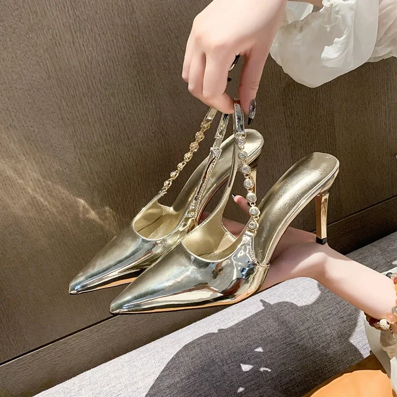 Shiny High Heels Silver Metallic Pumps On Foot