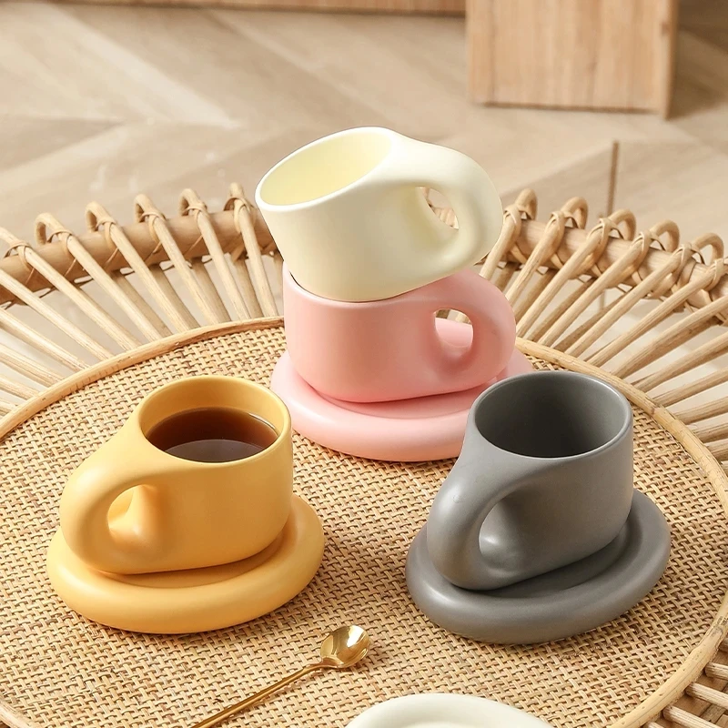 https://ae01.alicdn.com/kf/S4e53a371f18443a78e32a05815fc296aU/Handmade-Fat-Handle-Mug-Ceramic-Espresso-Mugs-Personalized-Cappuccino-Coffee-Cups-with-Saucer-Breakfast-Milk-Tea.jpg