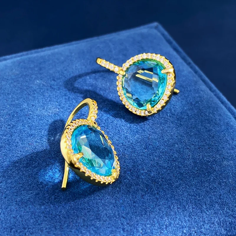 Crystal blue transparent gemstone style triangular earrings