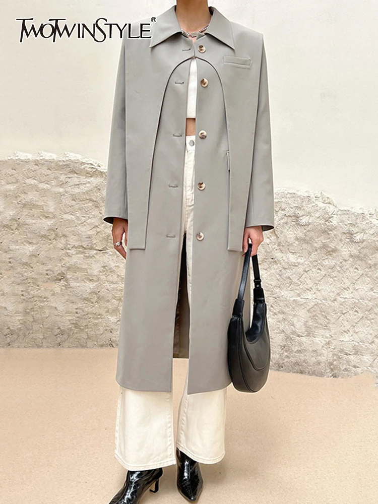 

TWOTWINSTYLE Spliced Pocket Solid Minimalist Loose Trench For Women Lapel Log Sleeve Patchwork Button Windbreaker Female 2023