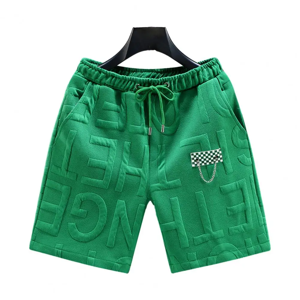 شورت رجالي بلون سادة شورت رياضي برباط لون سادة خصر مرن فوق الركبة مع جيوب كاجوال للرجال