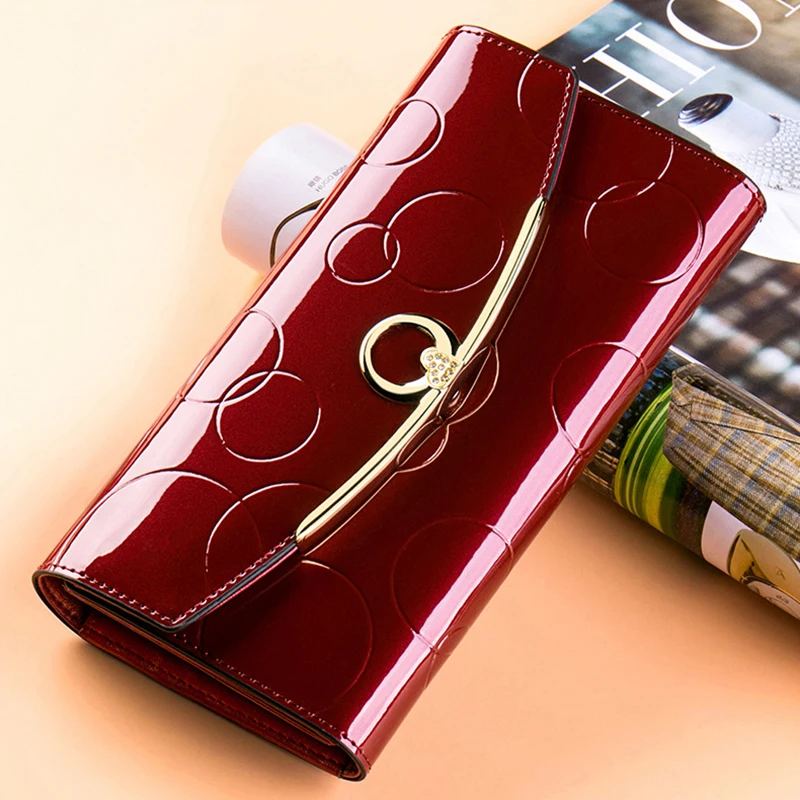 Women's wallet, long wallet for women with a pocket for a cell phone, luxury leather wallet designed for protection.