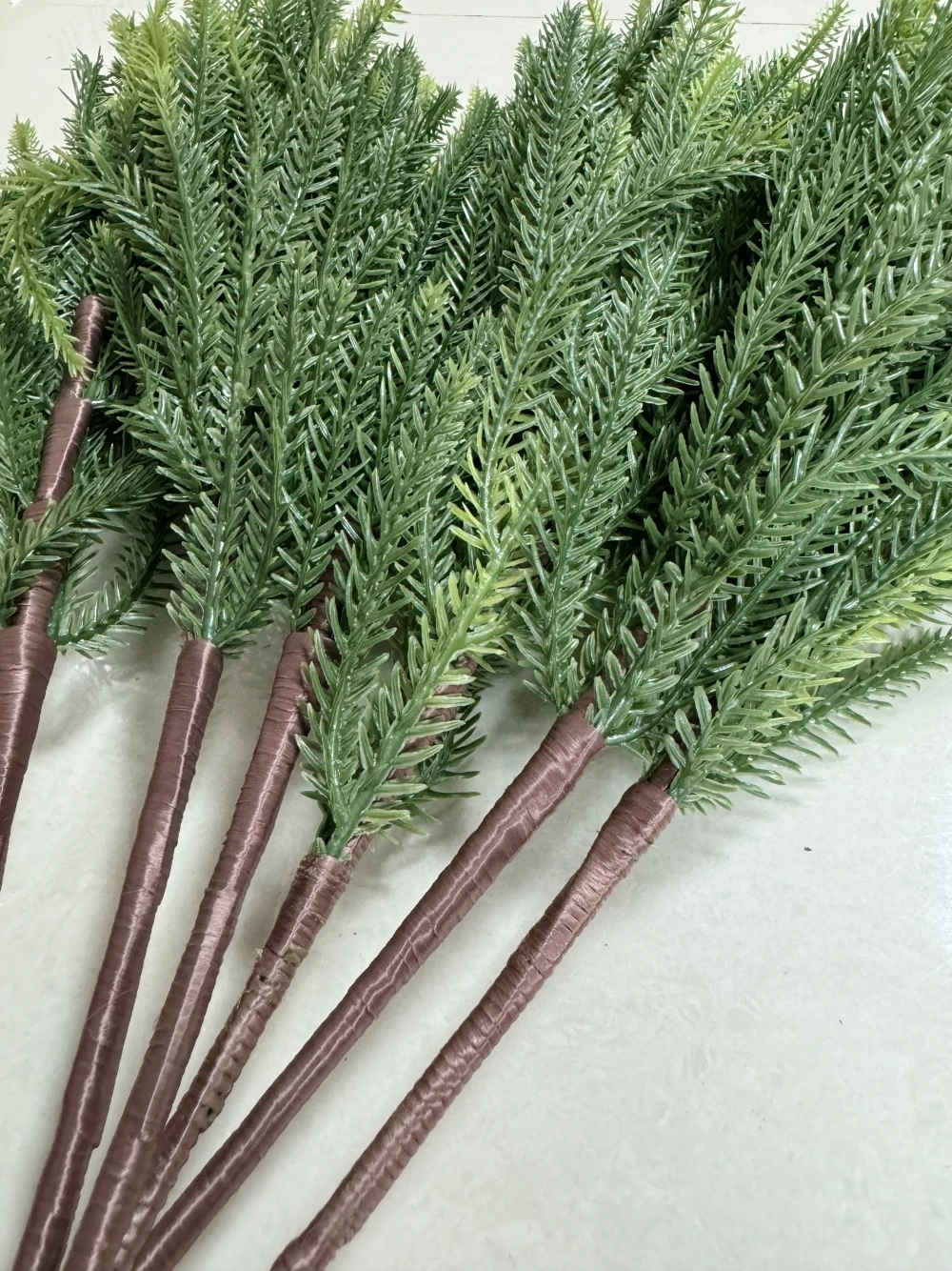 Description Picture 5 of item6-24Pcs Christmas Norfolk Pine Branches 22" Fake Greenery Pine Stems Artificial Plants Pine Needle for Indoor Outdoor Decor