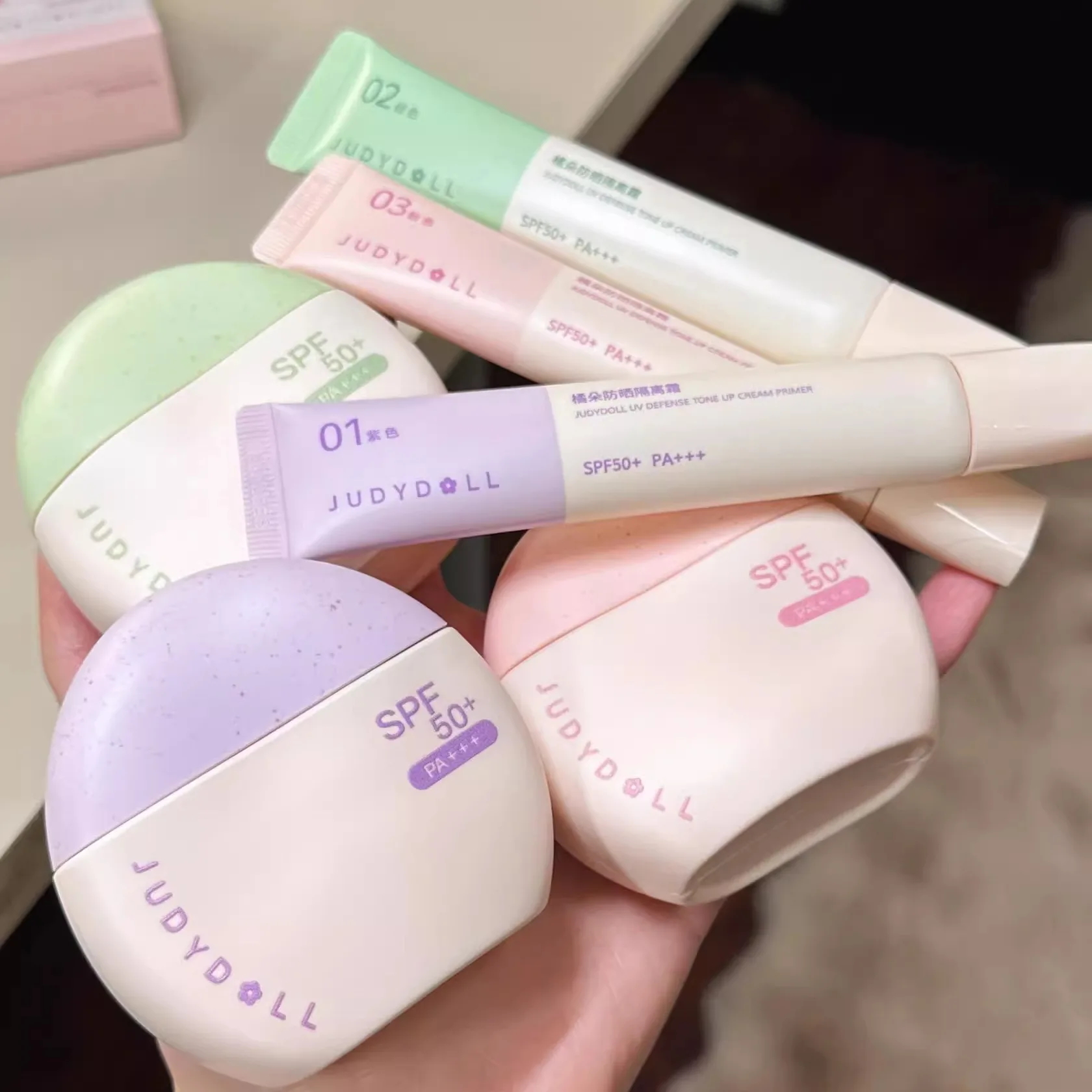 Judydoll SPF50+ sunscreen isolation cream purple makeup primer brightens and moisturizes purple bandage sunscreen