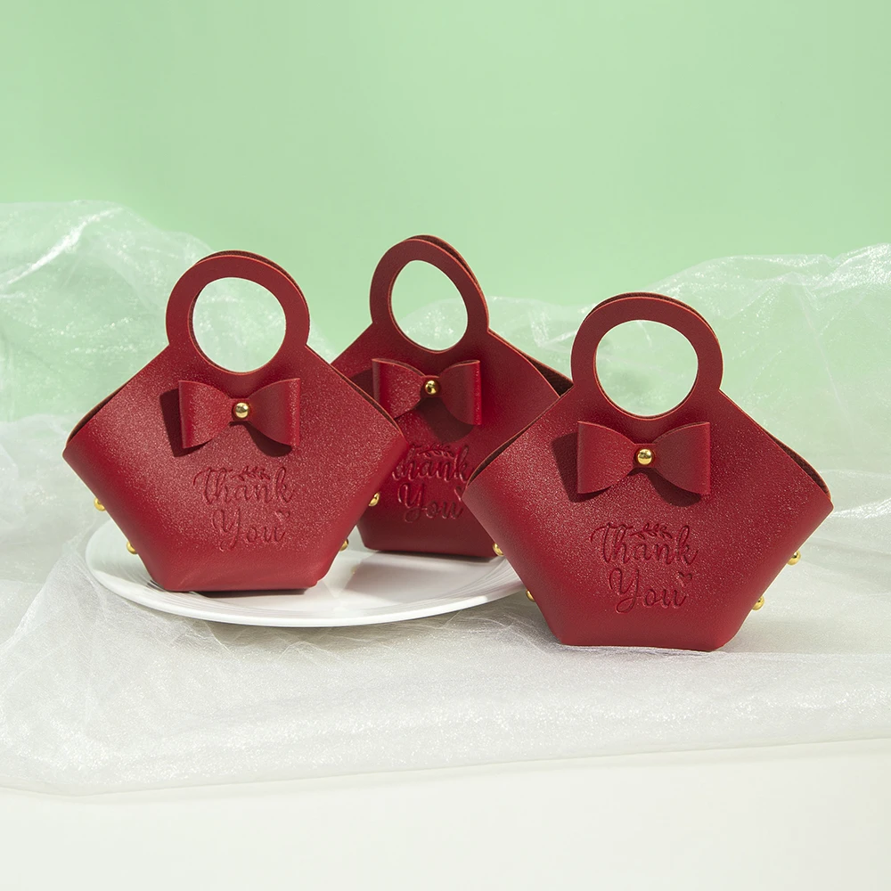 Weihnachten rote PU-Leder Schmuck Süßigkeiten Tasche Box 16x9x7cm Hochzeit Süßigkeiten Schokolade Handtasche mit Schleife Seife Parfüm Strumpf Beutel – Detail 4