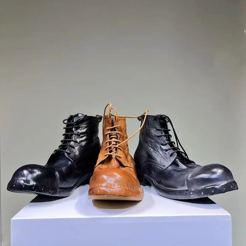 

New high-end Goodyear leather men shoes washed to make old handmade vintage motorcycle cowboy boots.