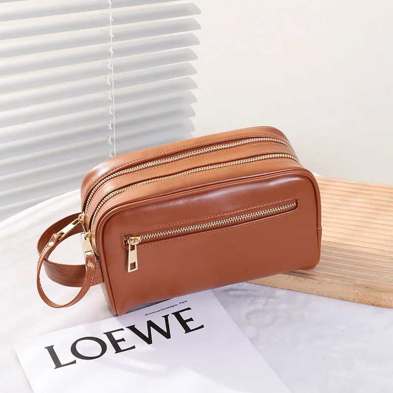 2023 New Unisex Makeup Bag Fashion High Quality Leather Travel Storage Bag Solid Color Versatile Large Capacity Portable Handbag