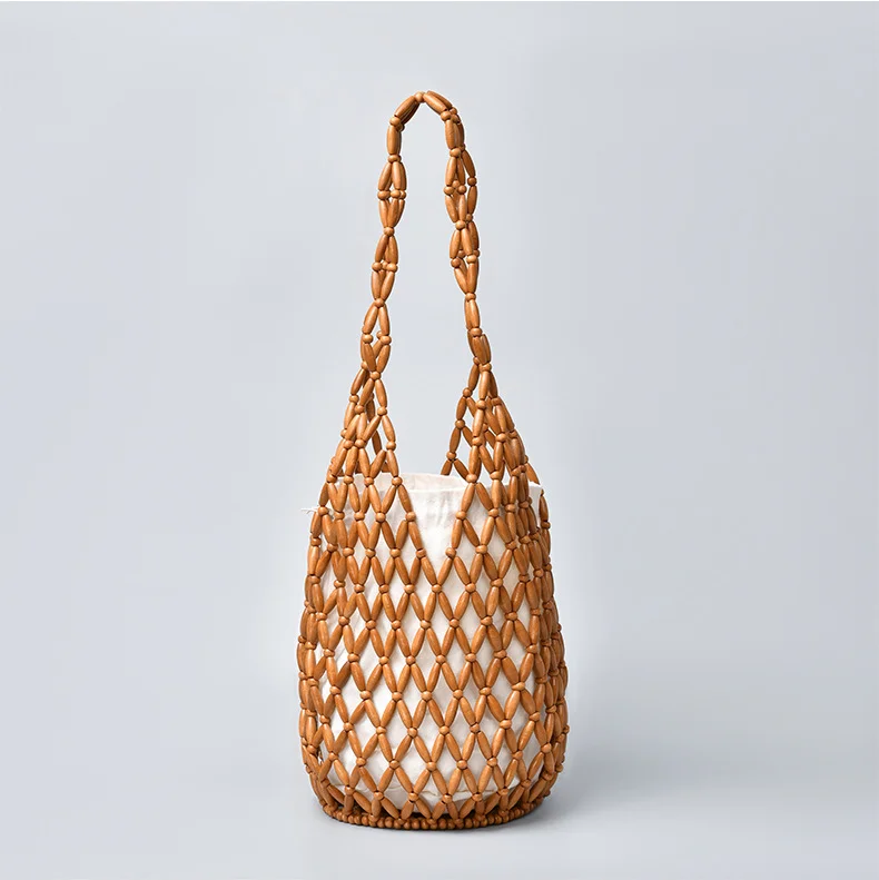 Borsa a spalla donna intrecciata con perline in legno borsa a secchiello_voghion.com